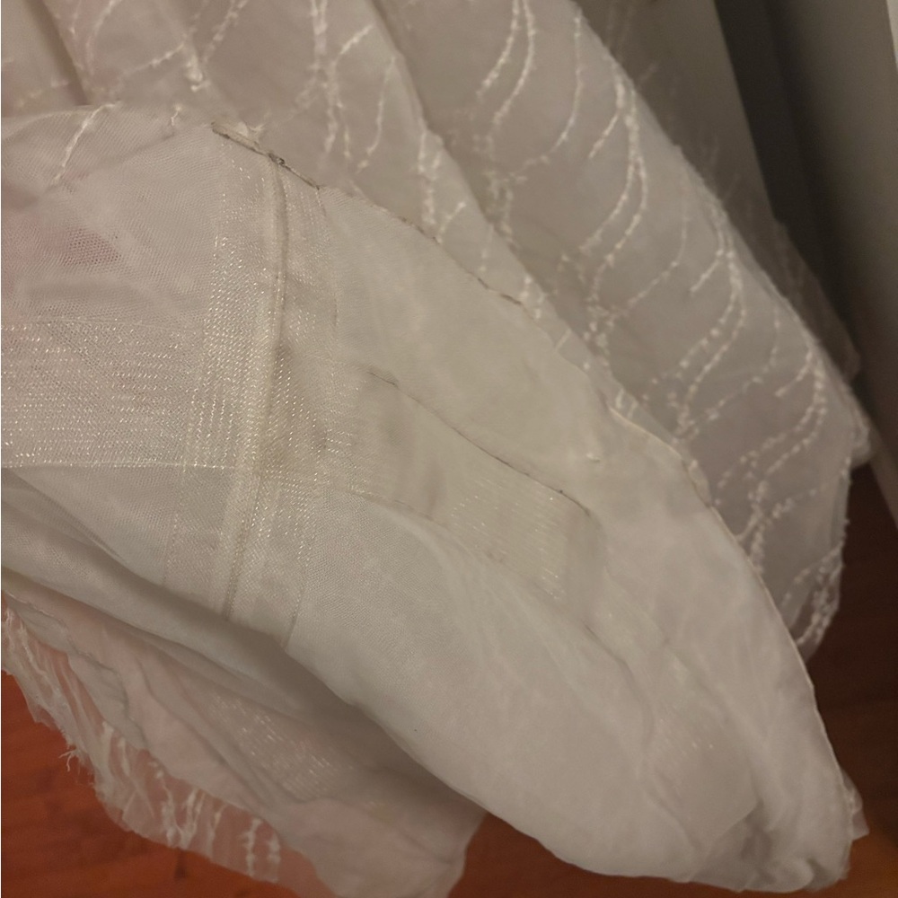 Mira Zwillinger Marvel
Elegant White Strapless Wedding Dress - Picture 16 of 16